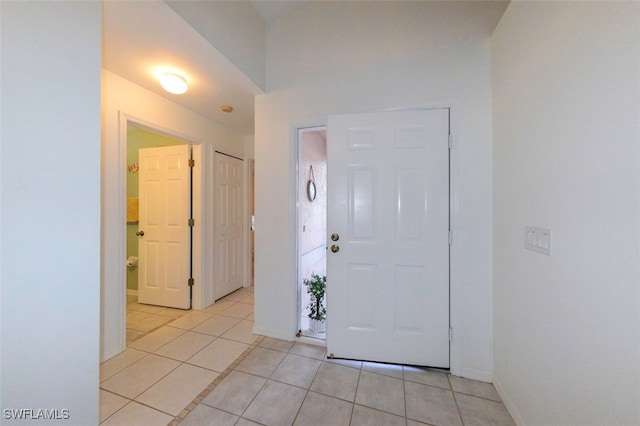 entryway featuring light tile patterned flooring