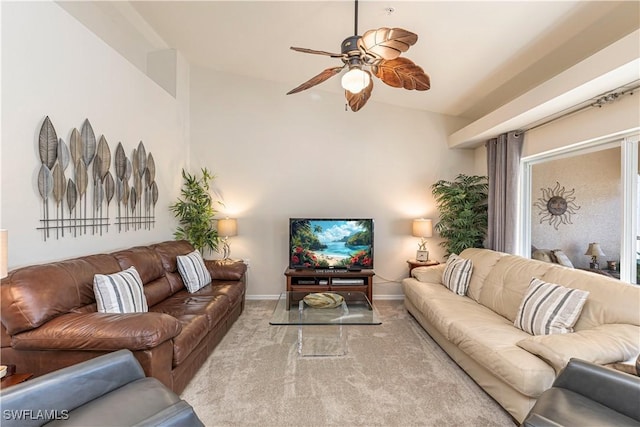 living room with a ceiling fan, light colored carpet, and baseboards