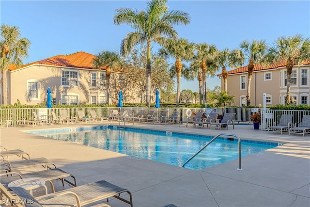 2895 Cypress Trace Cir Unit 202, Naples, FL 34119 - community pool with a patio