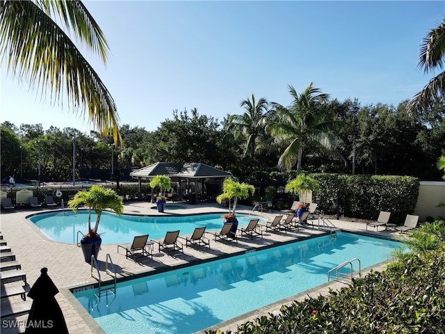 community pool with a patio