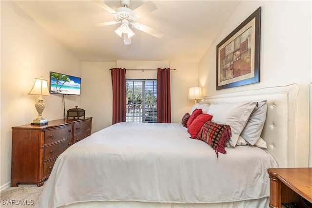 2895 Cypress Trace Cir Unit 202, Naples, FL 34119 - bedroom with ceiling fan, lofted ceiling, baseboards, and light colored carpet