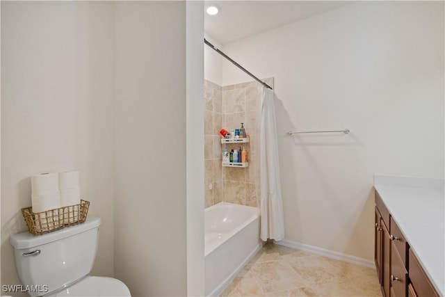 full bathroom featuring toilet, vanity, and shower / tub combo with curtain