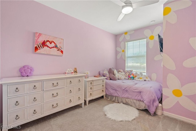 bedroom with ceiling fan and light colored carpet