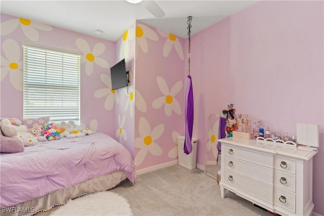 bedroom featuring ceiling fan and light colored carpet