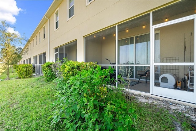 2669 Citrus St, Naples, FL 34120 - view of property exterior with stucco siding