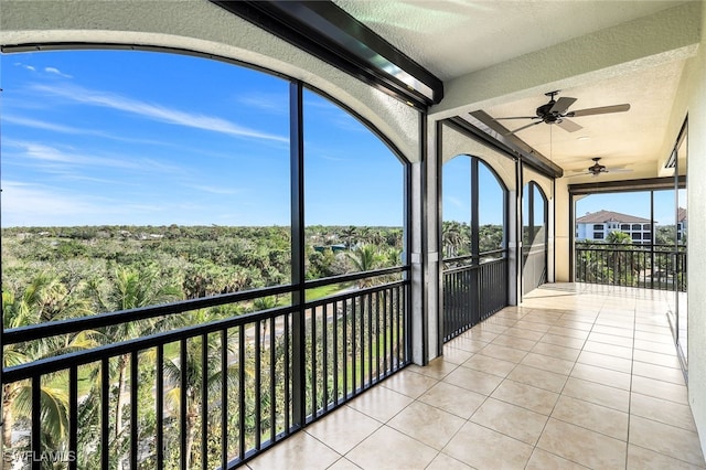 unfurnished sunroom featuring a wealth of natural light