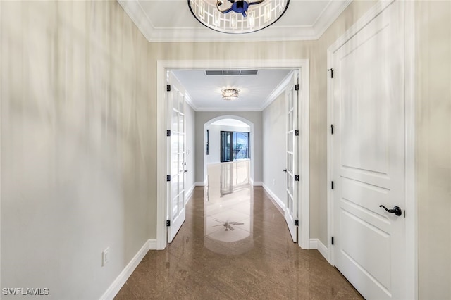 hallway featuring ornamental molding