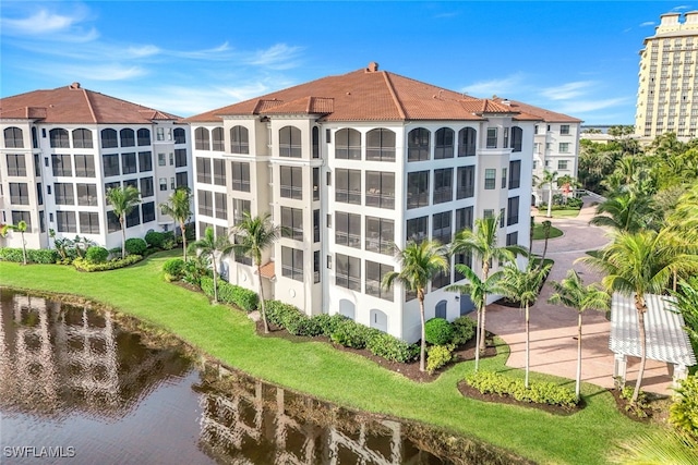 view of building exterior featuring a water view