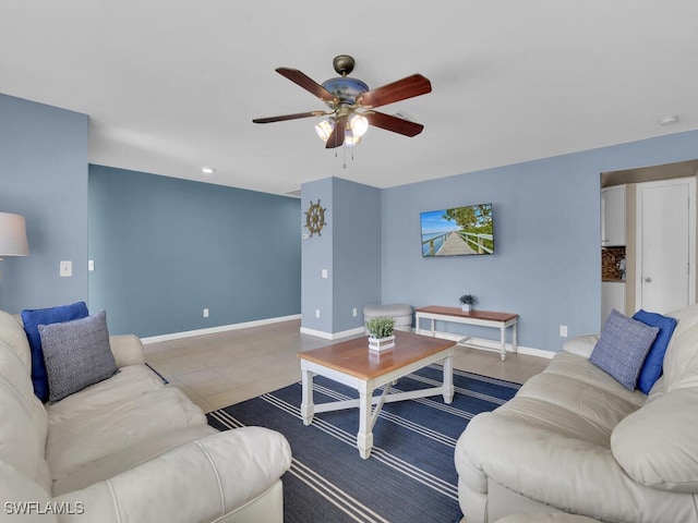 living room featuring ceiling fan