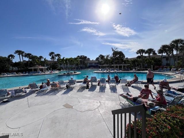 community pool with a patio