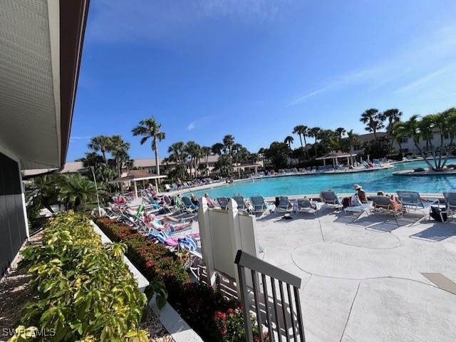 pool with a patio area