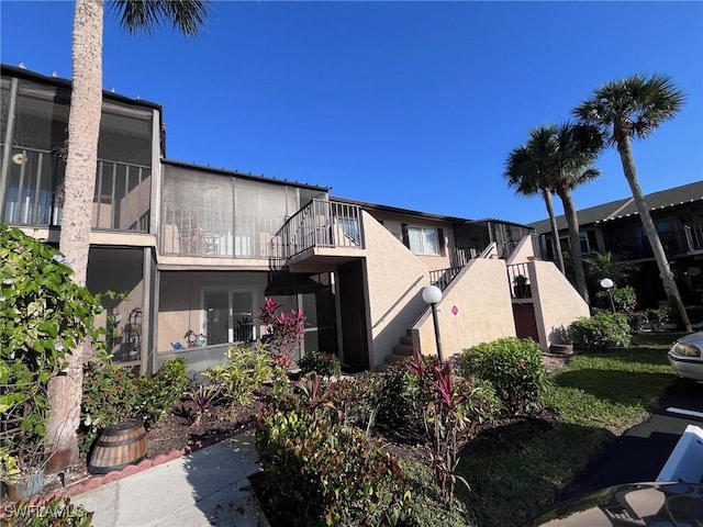 view of property with stairs