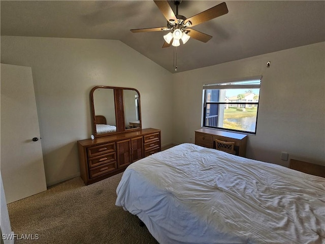 bedroom featuring carpet, ceiling fan, and lofted ceiling