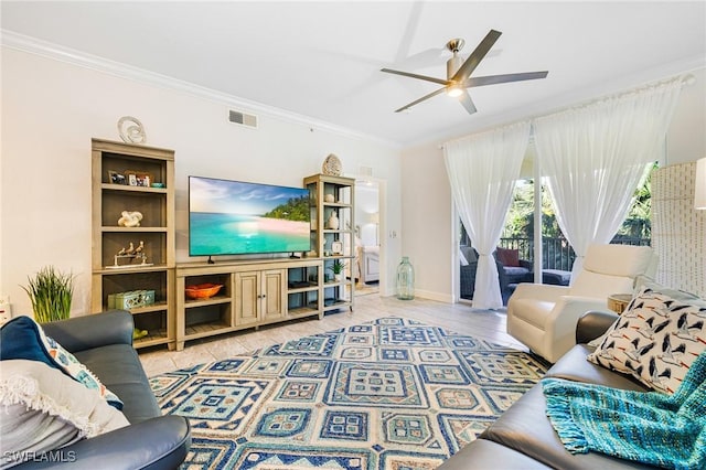 living room featuring ceiling fan, light hardwood / wood-style flooring, and ornamental molding