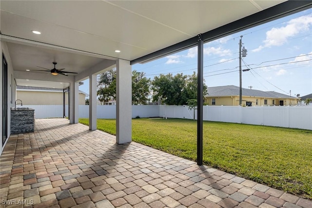 view of patio / terrace with ceiling fan