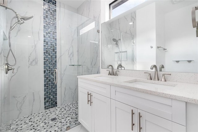 bathroom with vanity and walk in shower