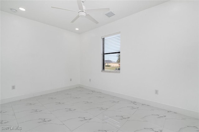 unfurnished room with ceiling fan