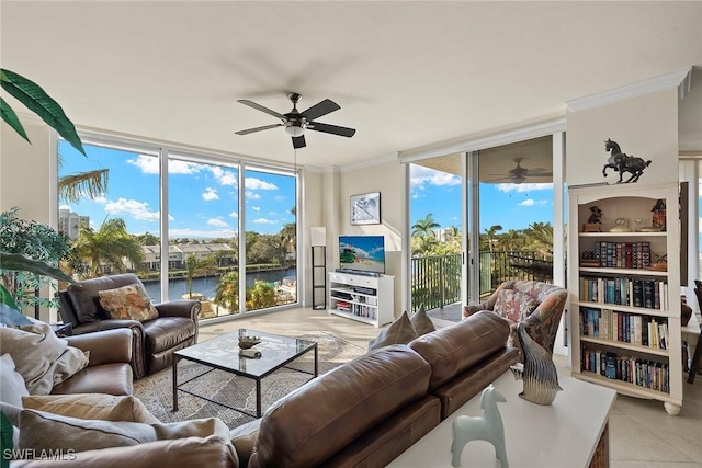 sunroom / solarium featuring ceiling fan and plenty of natural light