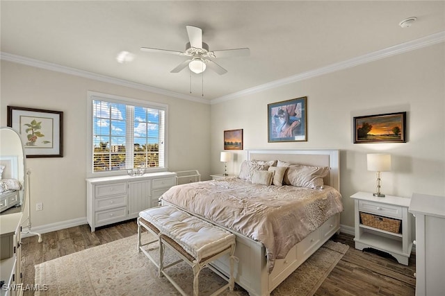 bedroom with ceiling fan, ornamental molding, and dark wood-type flooring