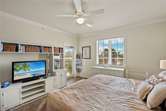 bedroom featuring light wood-type flooring, ceiling fan, and ornamental molding