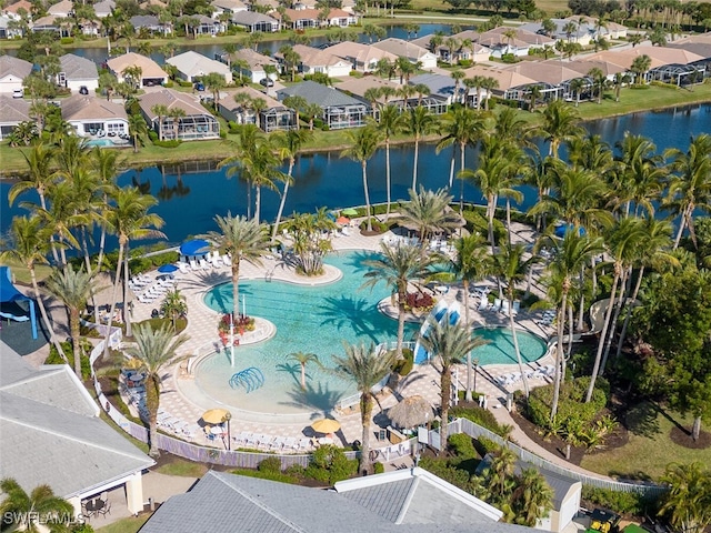 bird's eye view with a water view