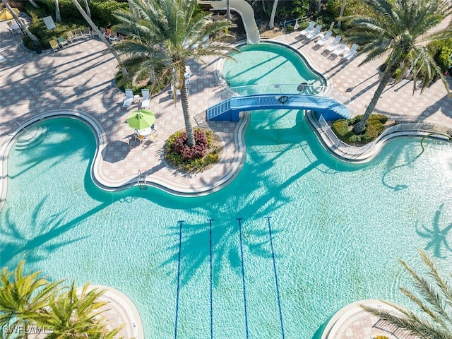 view of swimming pool featuring a water slide