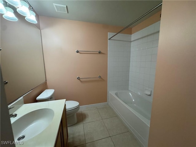 full bathroom featuring tile patterned floors, vanity, toilet, and bathing tub / shower combination