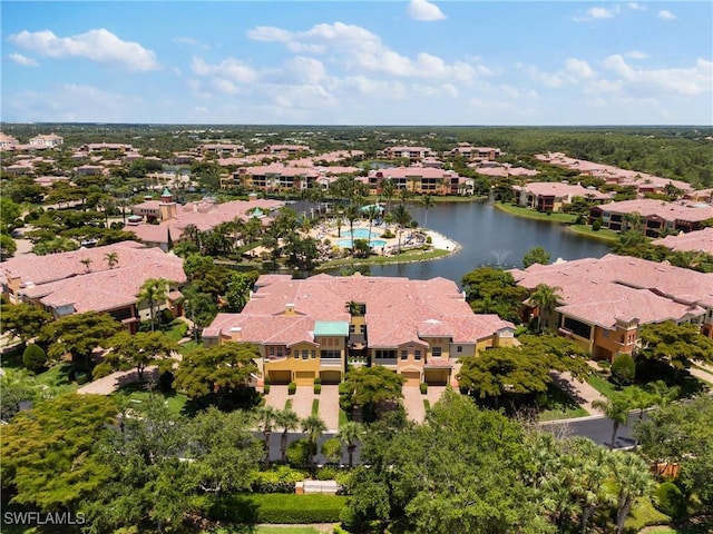 drone / aerial view with a water view