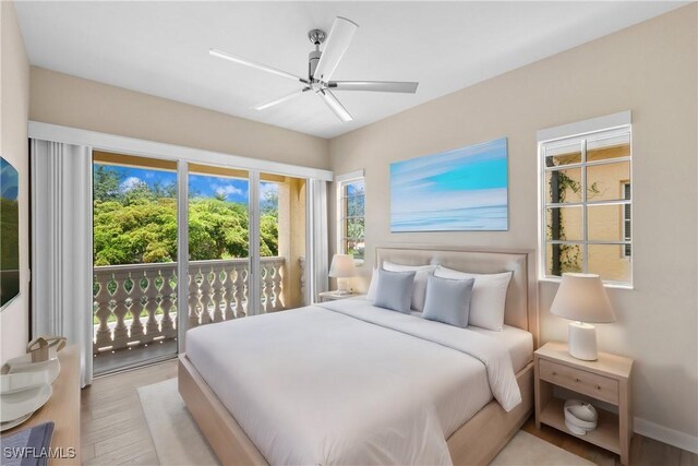 bedroom with ceiling fan, light wood-type flooring, and access to outside