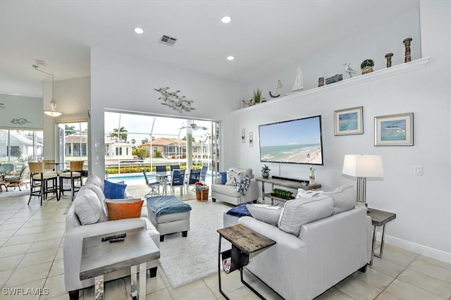 living room with light tile patterned flooring