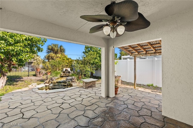 view of patio with ceiling fan