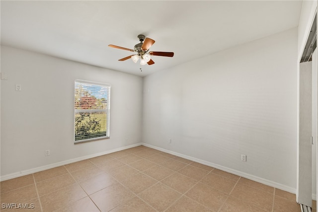 spare room featuring ceiling fan