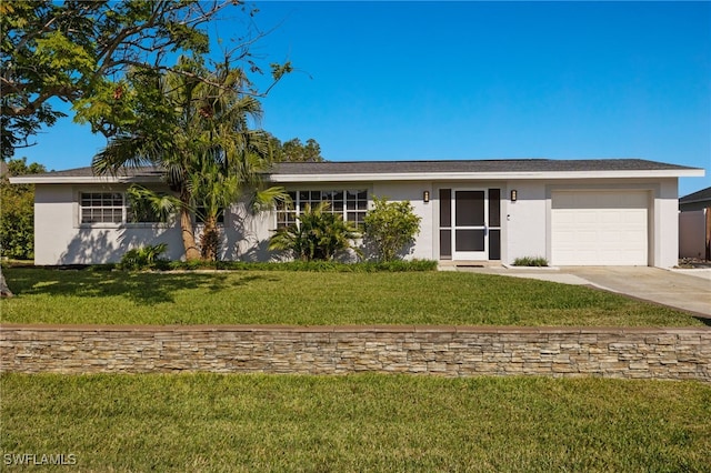 ranch-style home with a front yard and a garage