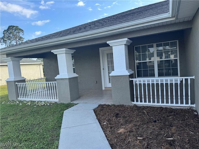 entrance to property with covered porch