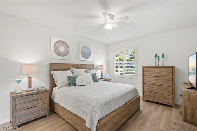 bedroom featuring ceiling fan and light hardwood / wood-style flooring