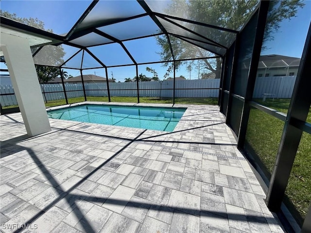 view of swimming pool with a patio and a fenced backyard