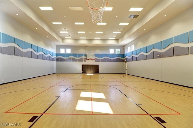 view of basketball court featuring a wealth of natural light