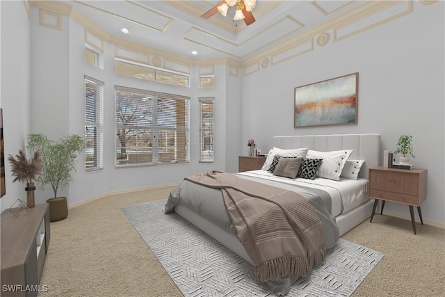 carpeted bedroom featuring a high ceiling, ceiling fan, ornamental molding, and coffered ceiling