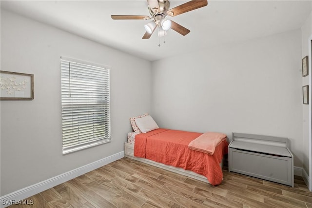 bedroom featuring ceiling fan and light hardwood / wood-style floors