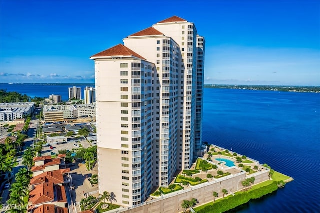 view of building exterior featuring a water view