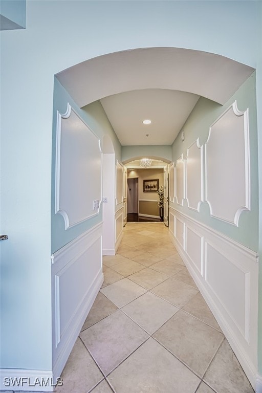 hallway with light tile patterned floors