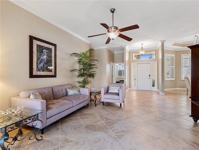 20838 Torre Del Lago St, Estero, FL 33928 - living room featuring a ceiling fan, crown molding, and baseboards