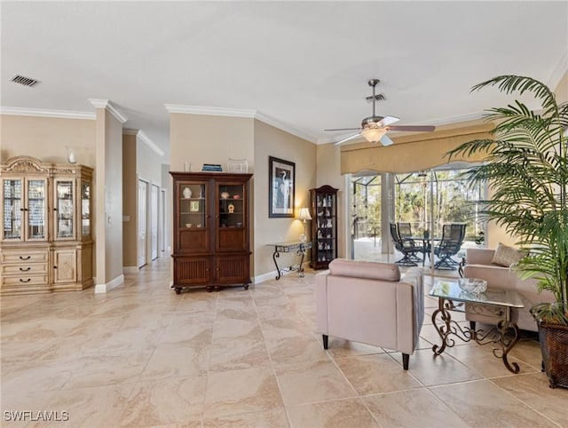 living room featuring ceiling fan and ornamental molding