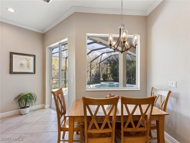 20838 Torre Del Lago St, Estero, FL 33928 - dining room featuring a chandelier, ornamental molding, baseboards, and light tile patterned floors