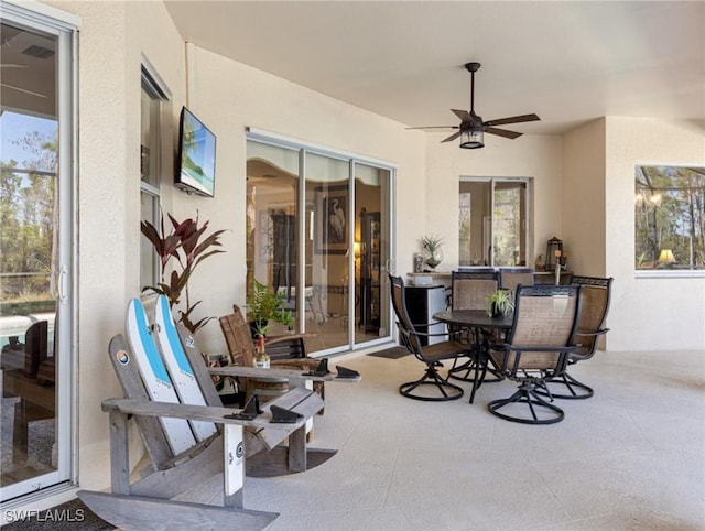 view of patio / terrace featuring ceiling fan