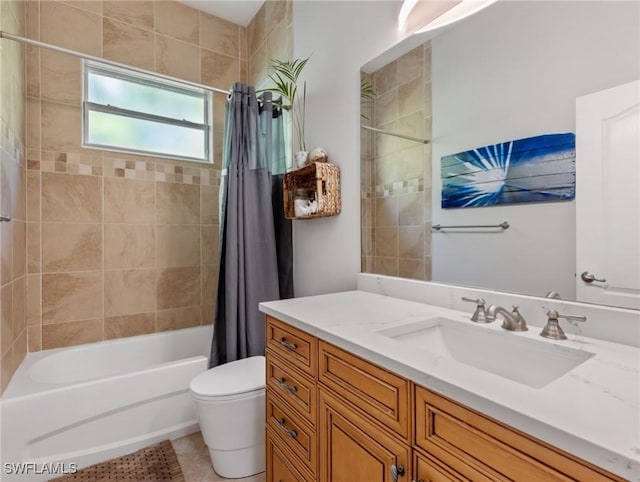 full bathroom with tile patterned flooring, shower / bath combination with curtain, toilet, and vanity