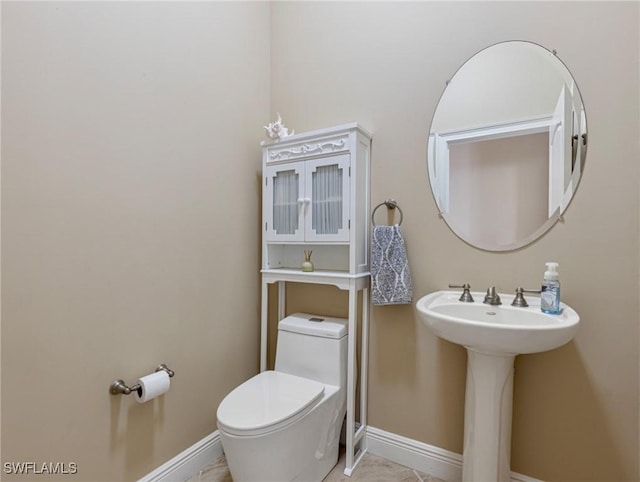 20838 Torre Del Lago St, Estero, FL 33928 - half bathroom featuring toilet and baseboards