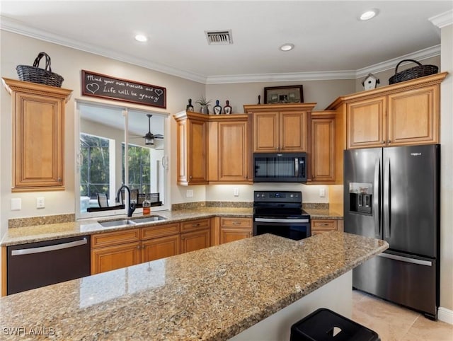 kitchen with black appliances, sink, ornamental molding, light tile patterned floors, and light stone counters