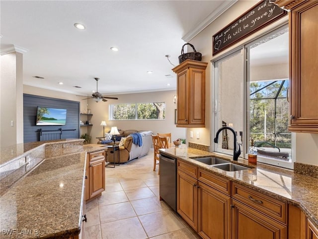 kitchen with light stone countertops, stainless steel dishwasher, crown molding, and sink