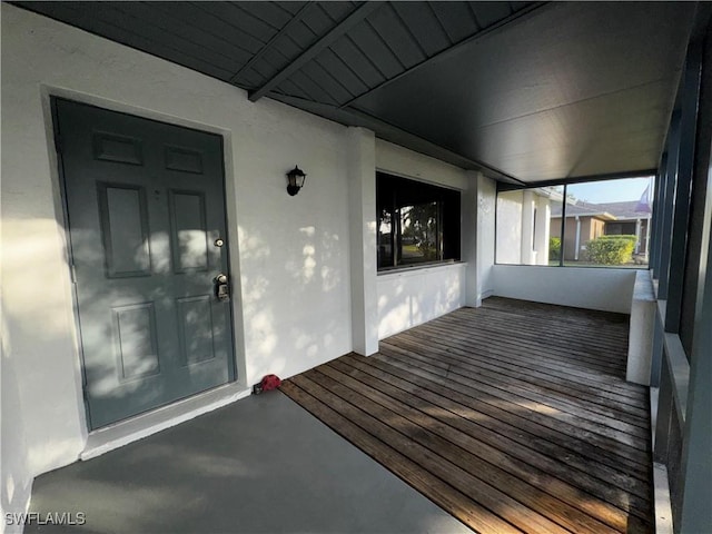 doorway to property with a porch